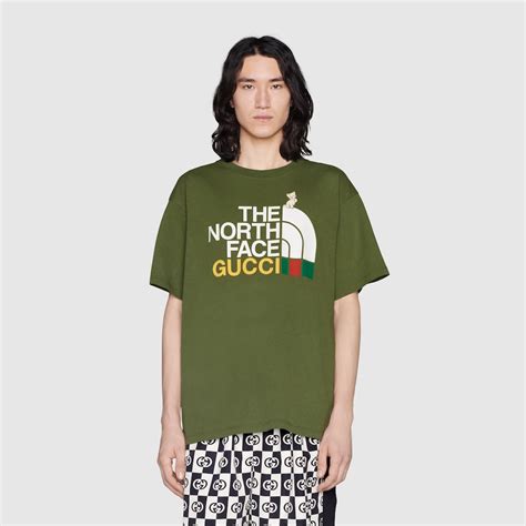 camiseta north face gucci